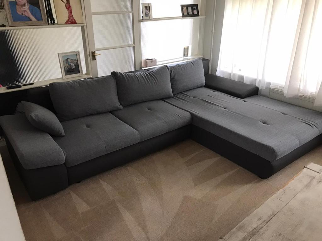 This is a photo taken of a grey corner sofa that has just been cleaned by The K&S Carpet Cleaners. The cream carpets were also cleaned at the same time. Photo taken in Kent | Sussex